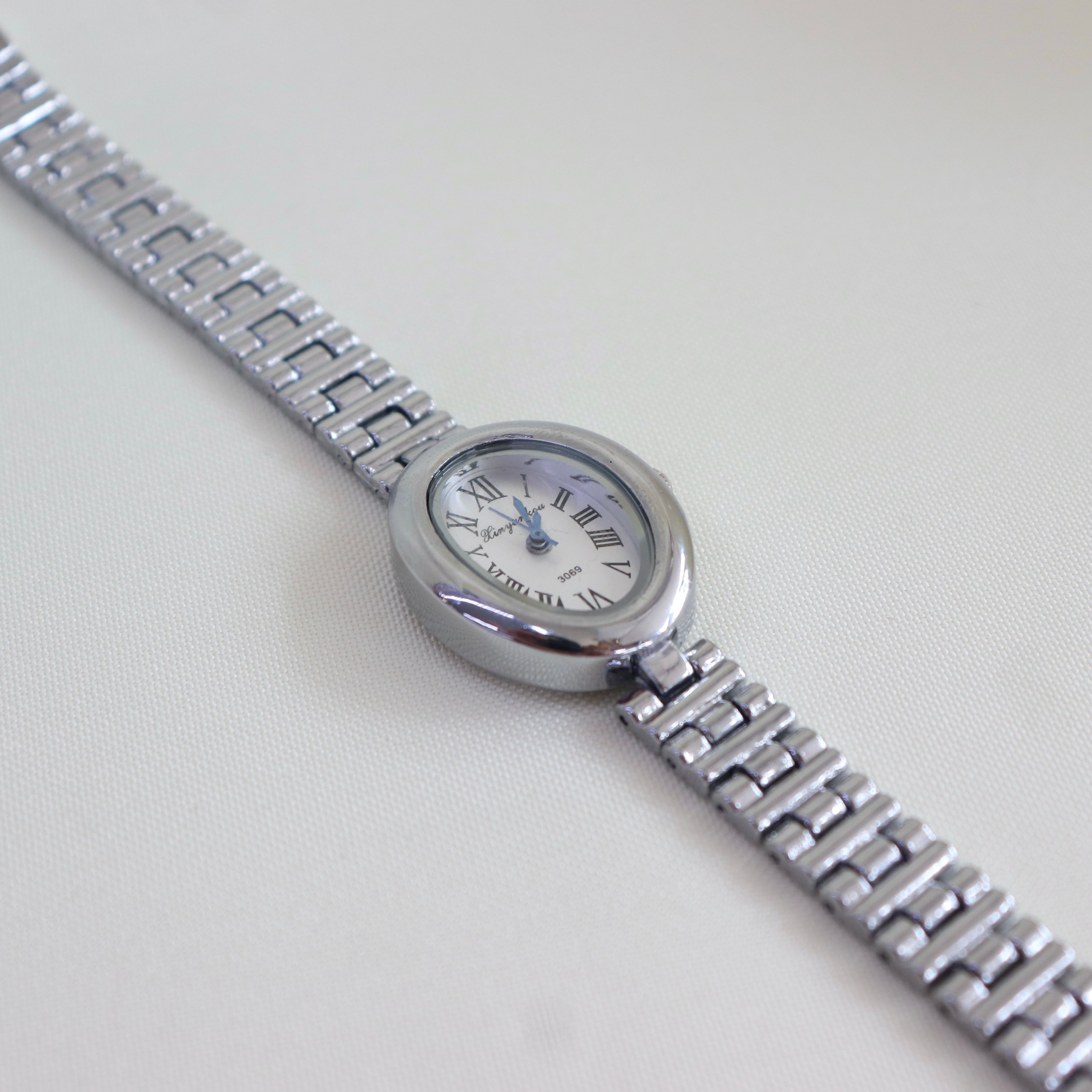 Reloj Ovalado
