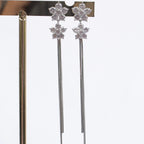 Aretes Largos Flores con Brillo