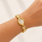 Reloj Ovalado con Perlas