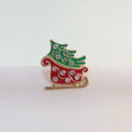 Broche Trineo