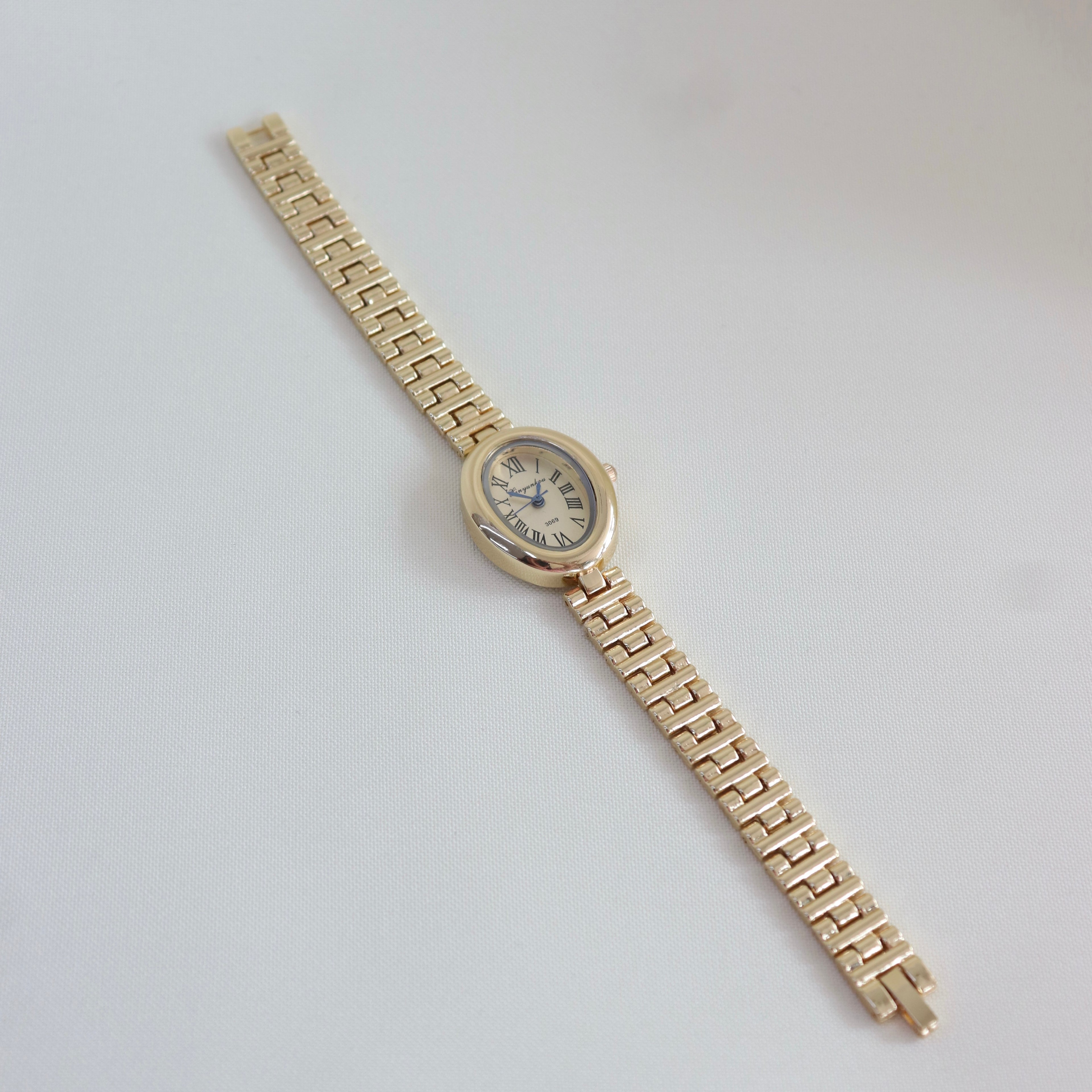 Reloj Ovalado