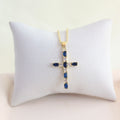 Collar Cruz con Cristales Azules