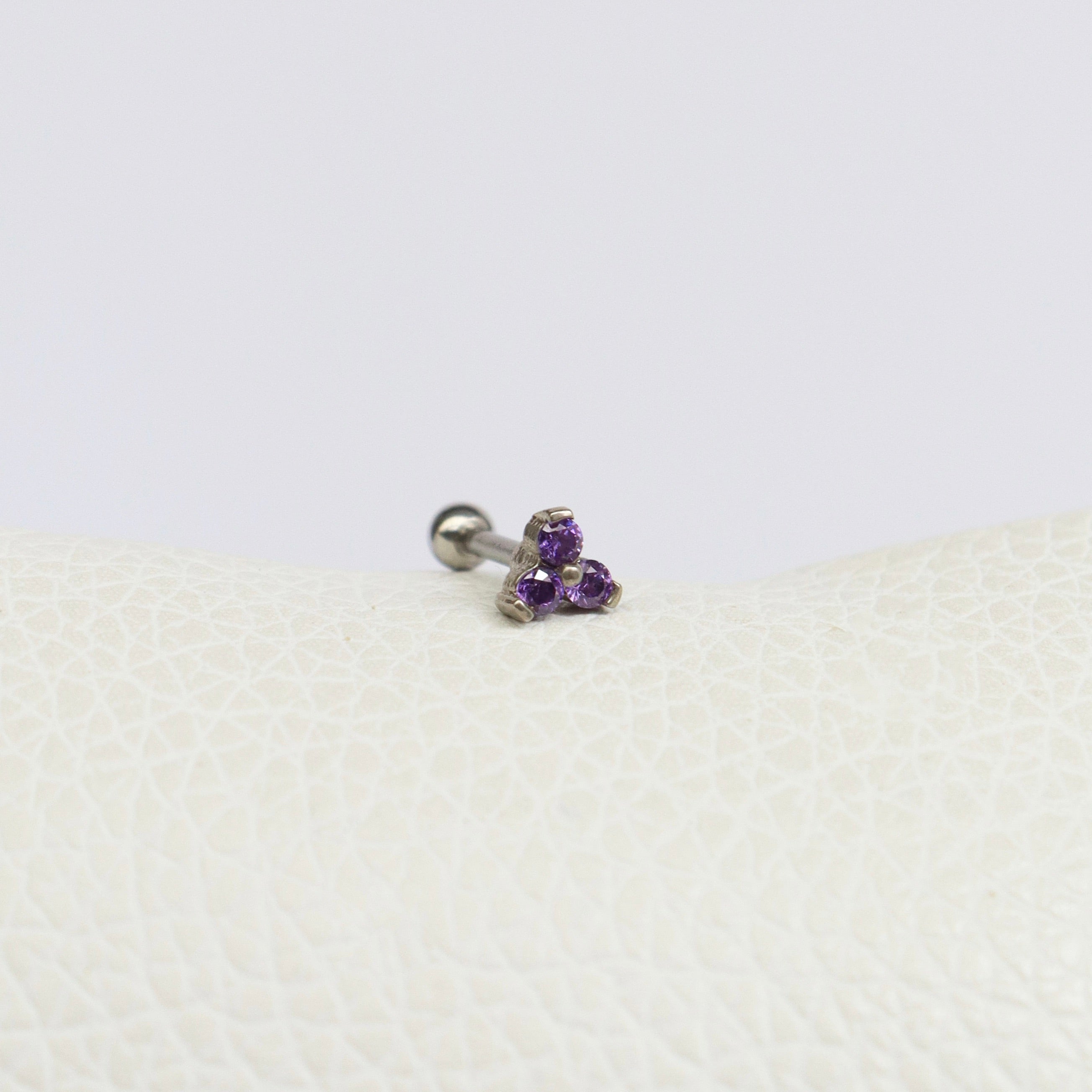 Piercing Flor Morada