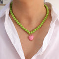 Collar Chicle Verde Corazón Rosado