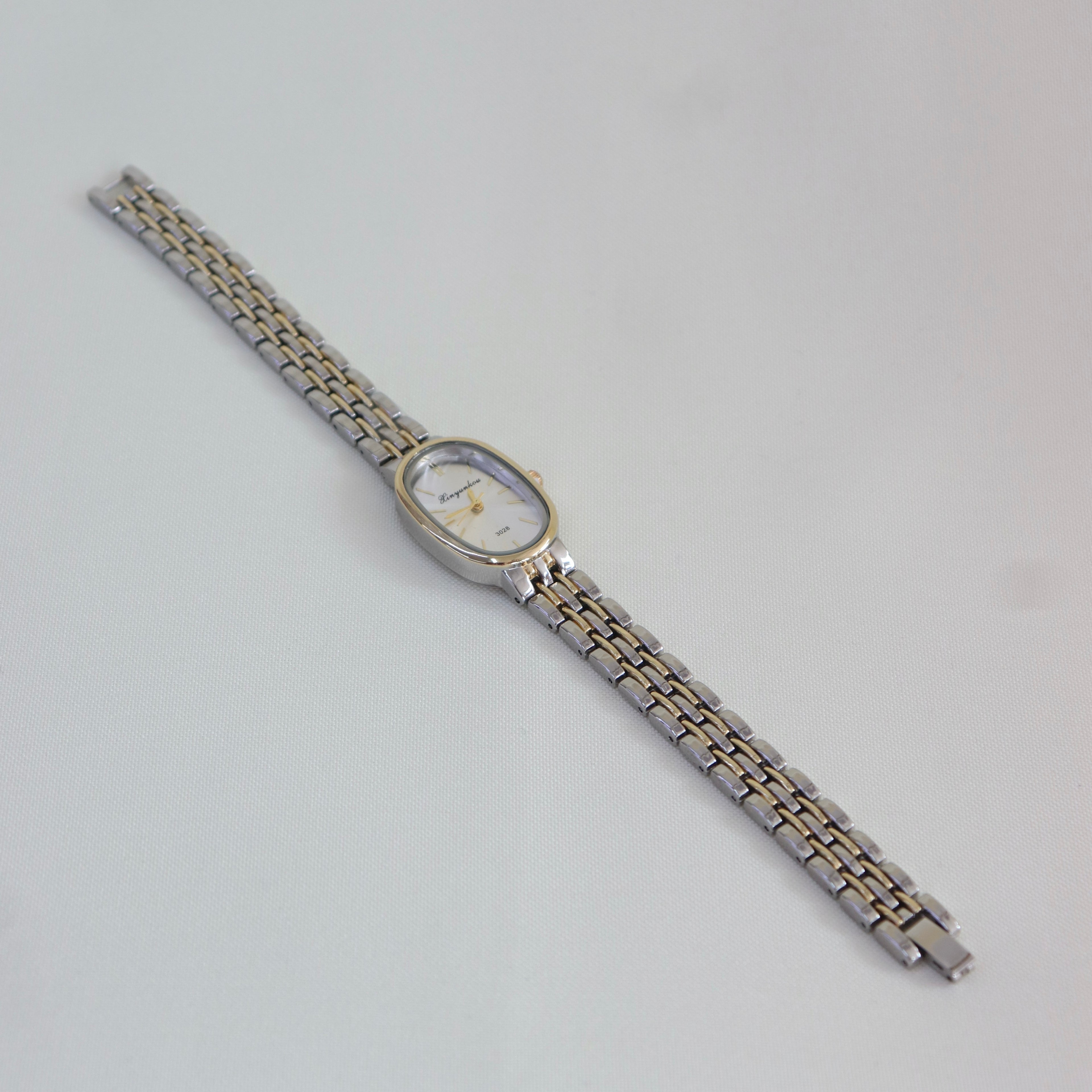 Reloj Ovalado