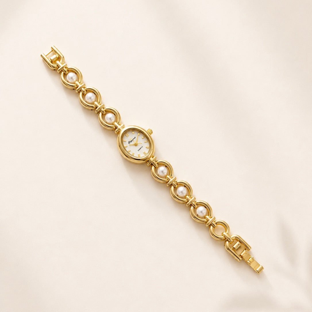 Reloj Ovalado con Perlas