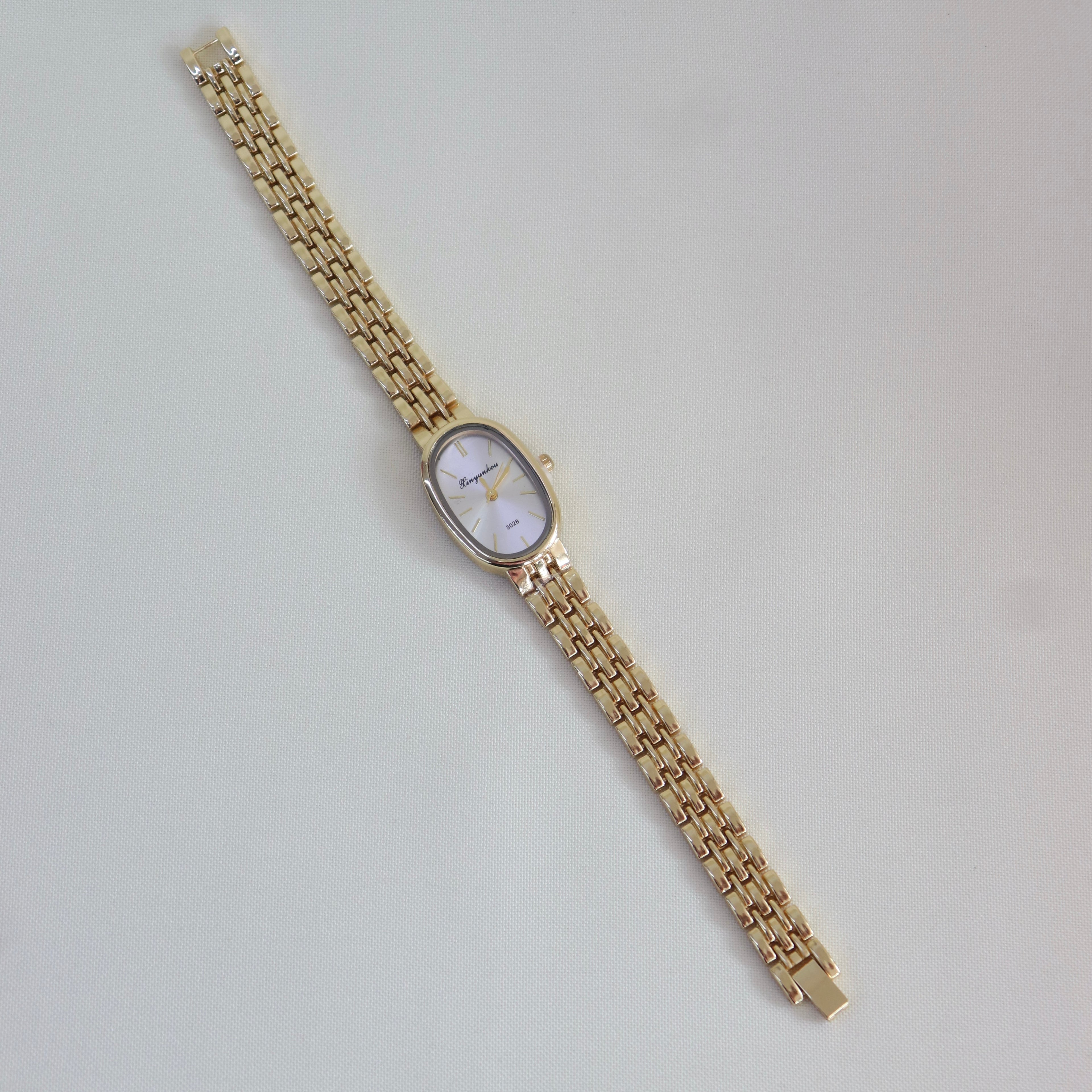 Reloj Ovalado