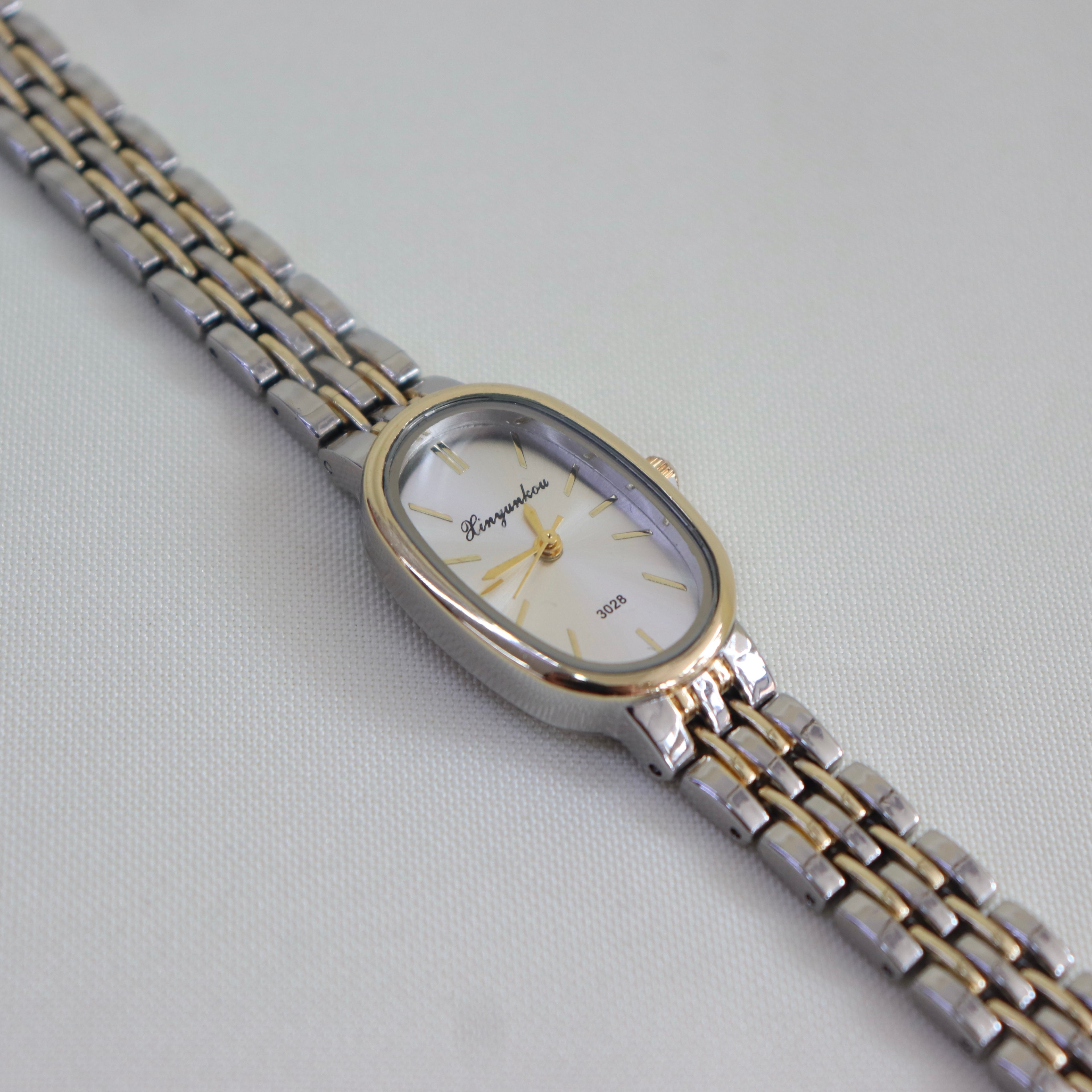 Reloj Ovalado
