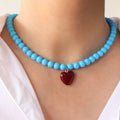Collar Chicle Celeste Corazón Vino
