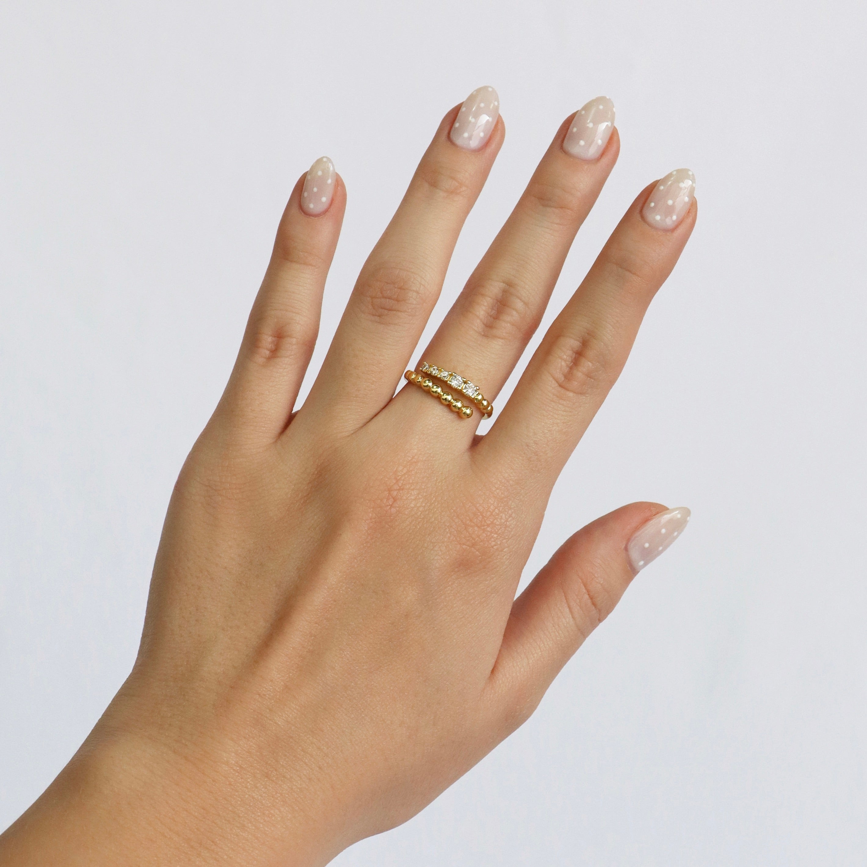 Anillo Ajustable Cruzado Cristales y Bolitas